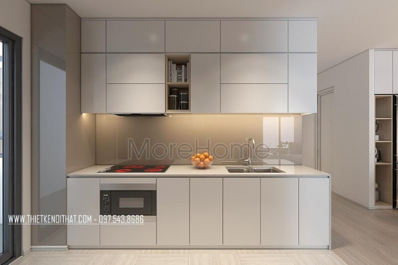 Với tone màu trắng chủ đạo, nội thất phòng bếp chung cư trông vô cùng gọn gàng và sạch sẽ Thiết kế phòng bếp, tủ bếp gỗ An Cường